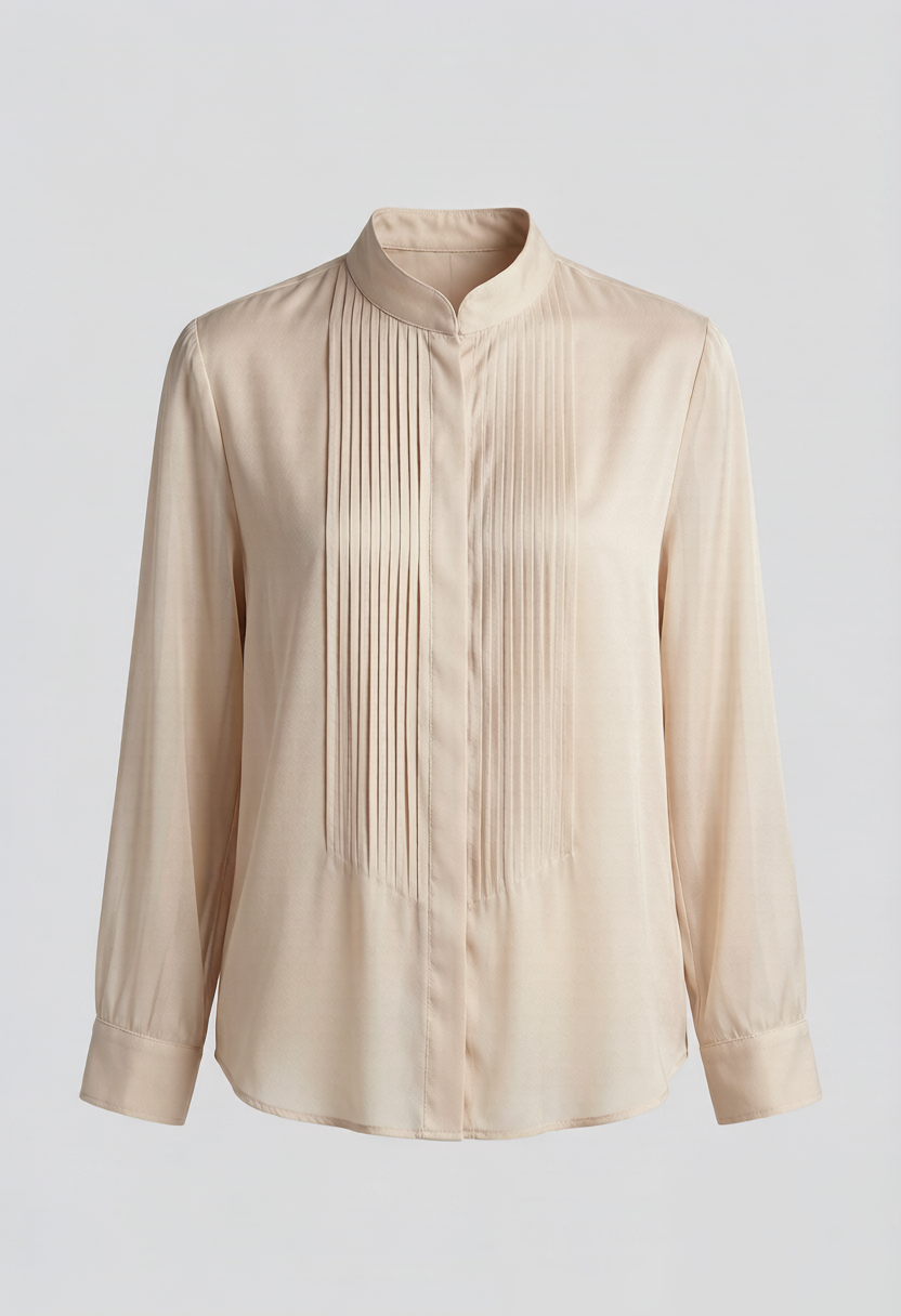 An ivory high-neck blouse with delicate cotton lace detailing, pintuck pleats, and leg-of-mutton sleeves. A romantic pie